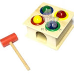 Caja martillo pelotitas golpe